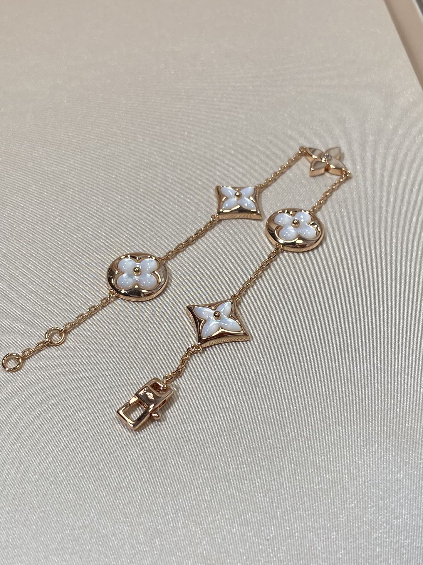 [Regal Gem]STAR AND SUN 5 MOTIF MOP PINK GOLD BRACELET