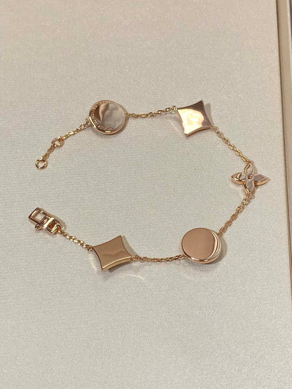 [Regal Gem]STAR AND SUN 5 MOTIF MOP PINK GOLD BRACELET