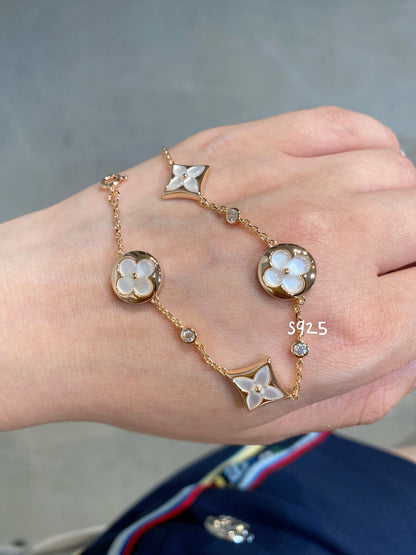 [Regal Gem]STAR AND SUN 4 MOTIF WHITE MOP PINK GOLD BRACELET