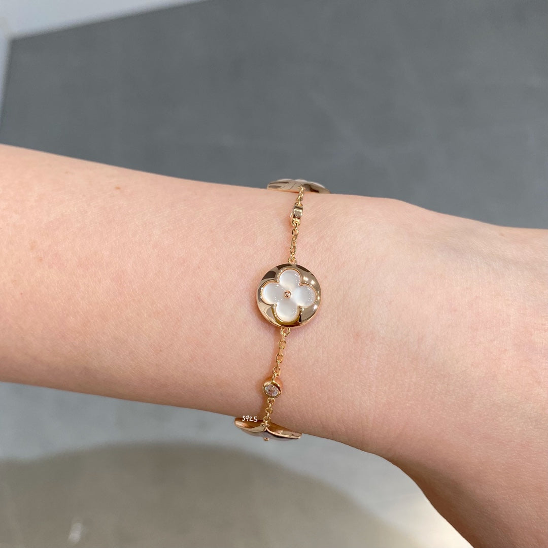 [Regal Gem]STAR AND SUN 4 MOTIF WHITE MOP PINK GOLD BRACELET