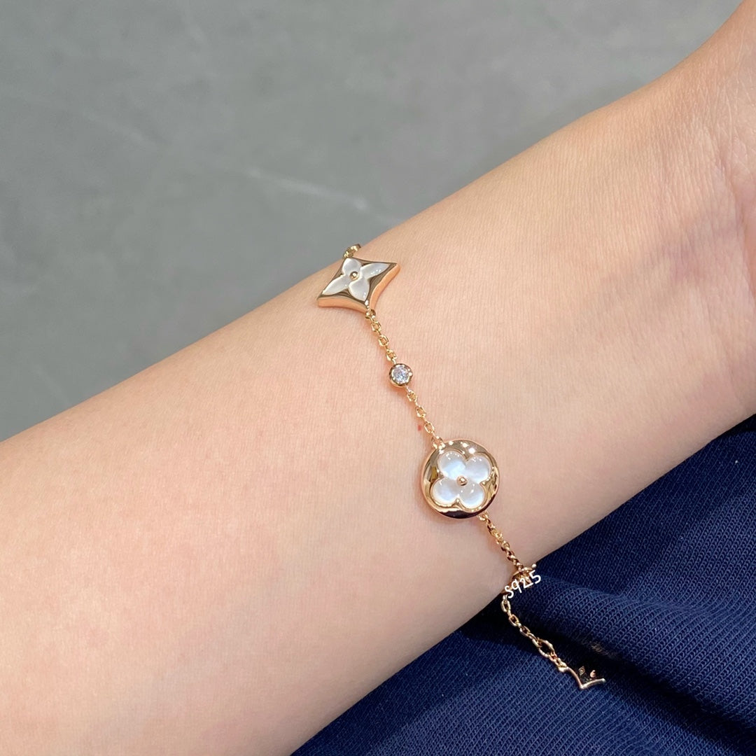 [Regal Gem]STAR AND SUN 4 MOTIF WHITE MOP PINK GOLD BRACELET