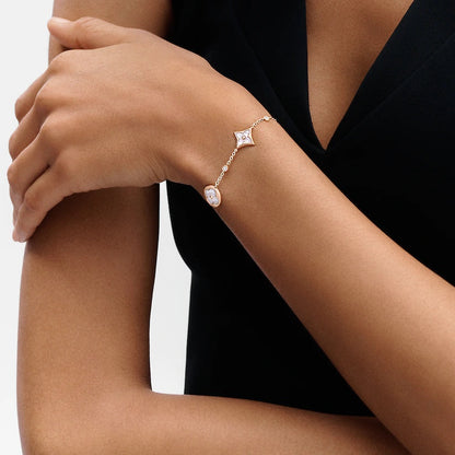 [Regal Gem]STAR AND SUN 4 MOTIF WHITE MOP PINK GOLD BRACELET